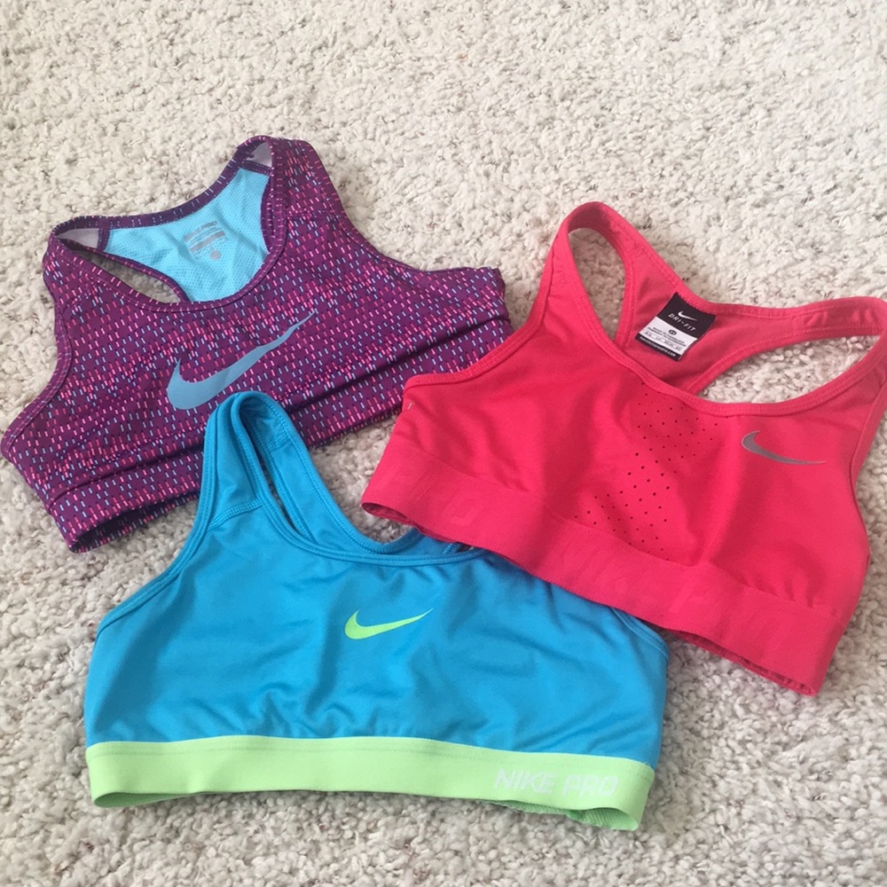 Three Nike sports bras